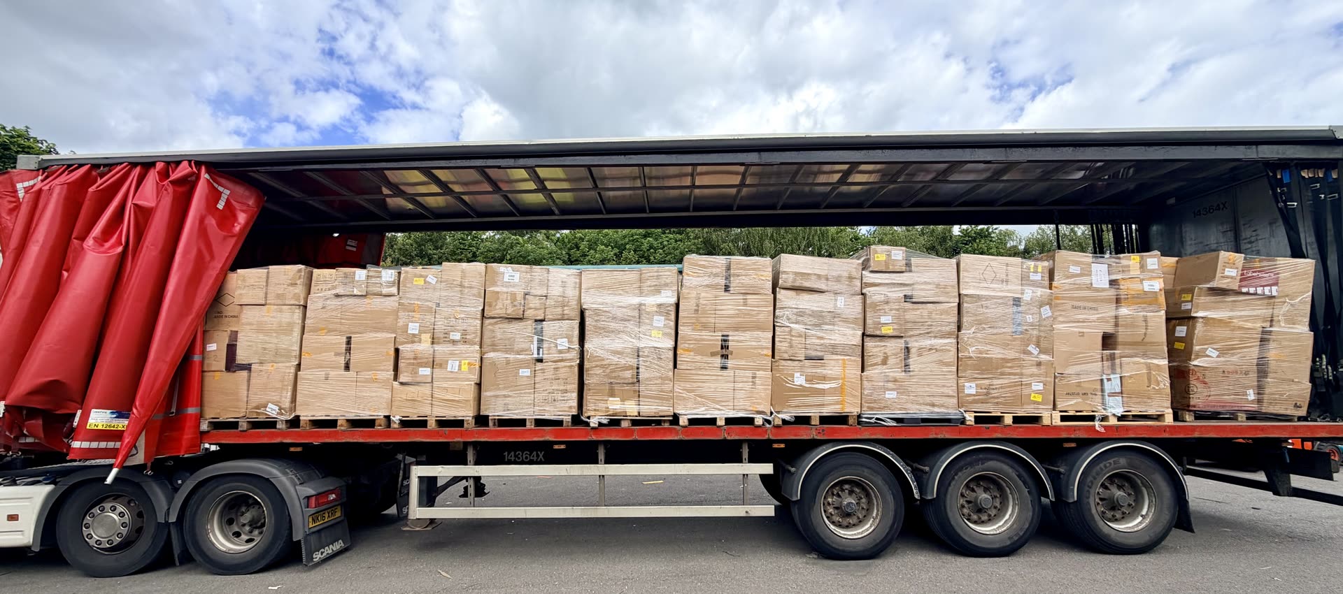 A WRP truckload arriving at our Nottingham warehouse — 24 mixed-source customer-return pallets, stacked and strapped, ready for trade buyers across the UK
